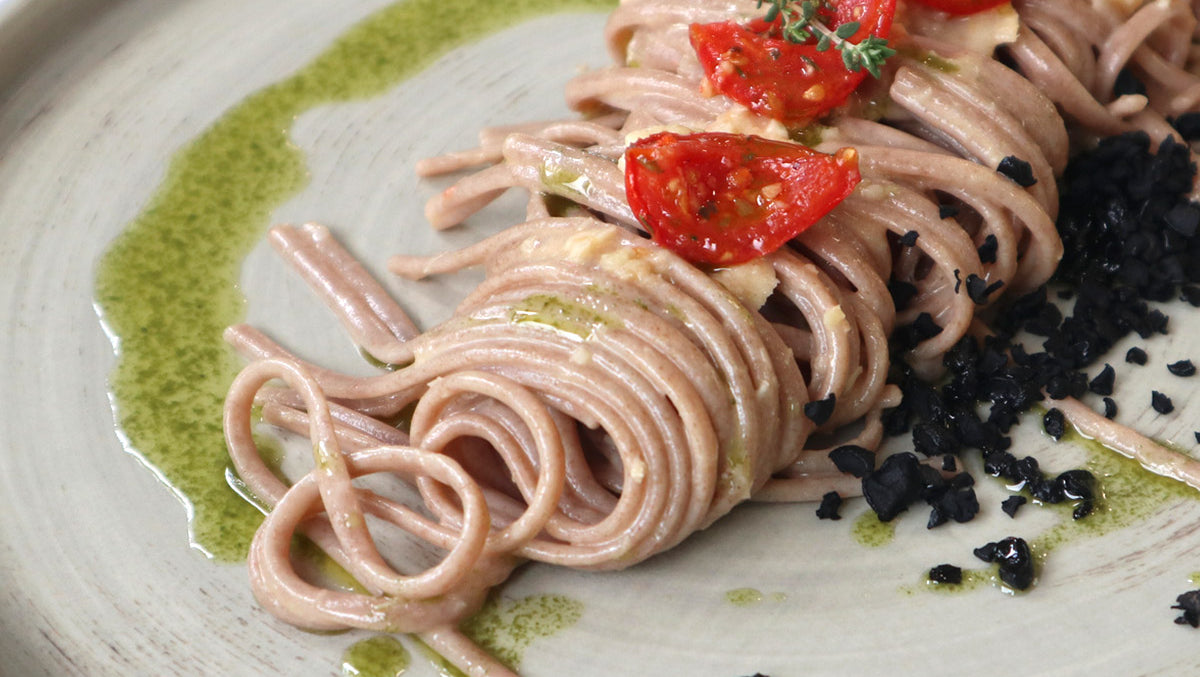 Linguine al ragù di scorfano, con terra di olive e pomodorini confit